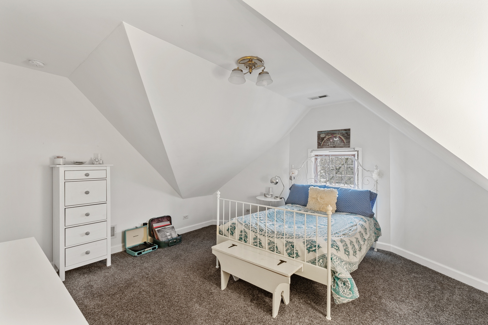 1333 Church Street Evanston, IL 60201 - Photo 25 of 32 a bedroom with furniture and a baby crib