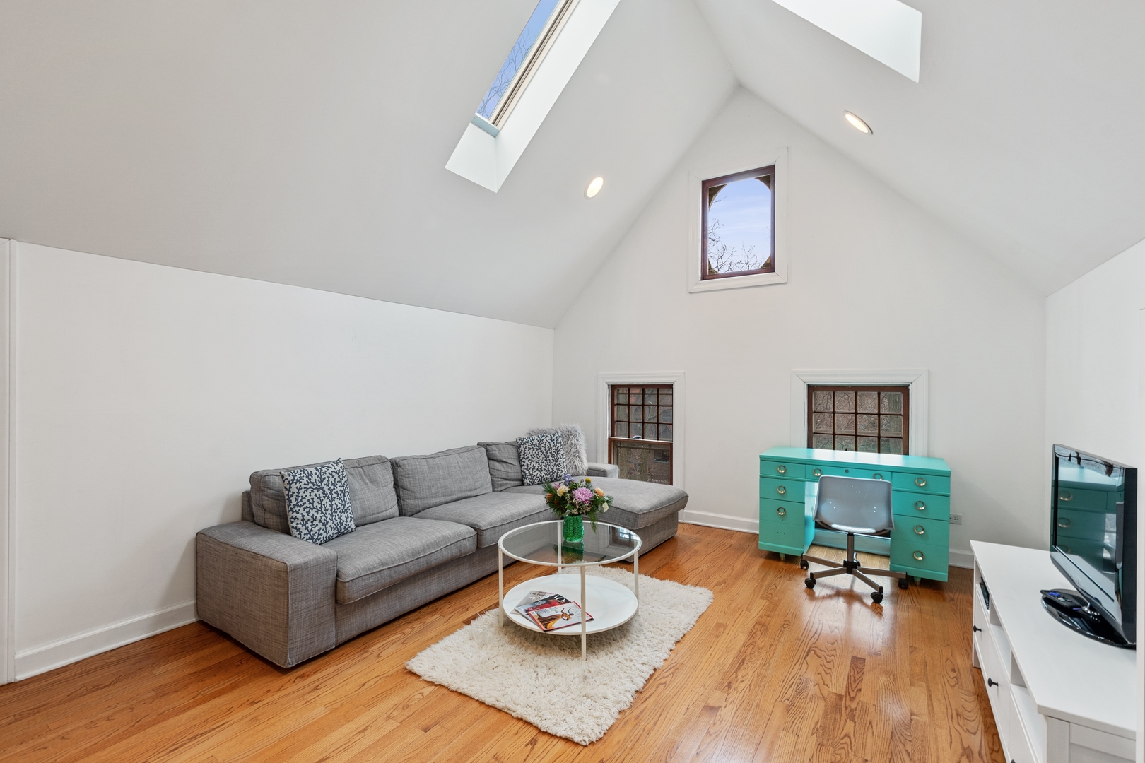 1333 Church Street Evanston, IL 60201 - Photo 26 of 32 a living room with furniture fireplace and wooden floor
