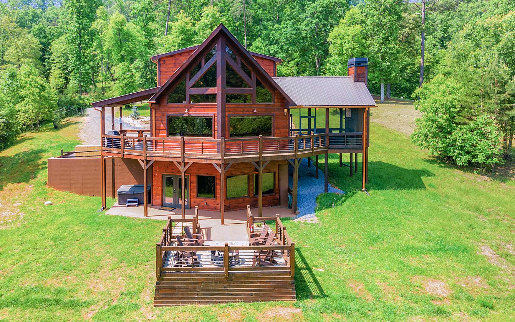 142 Cascade Trail Blue Ridge, GA 30513 - Photo 12 of 74 a view of a house with a yard porch and sitting area