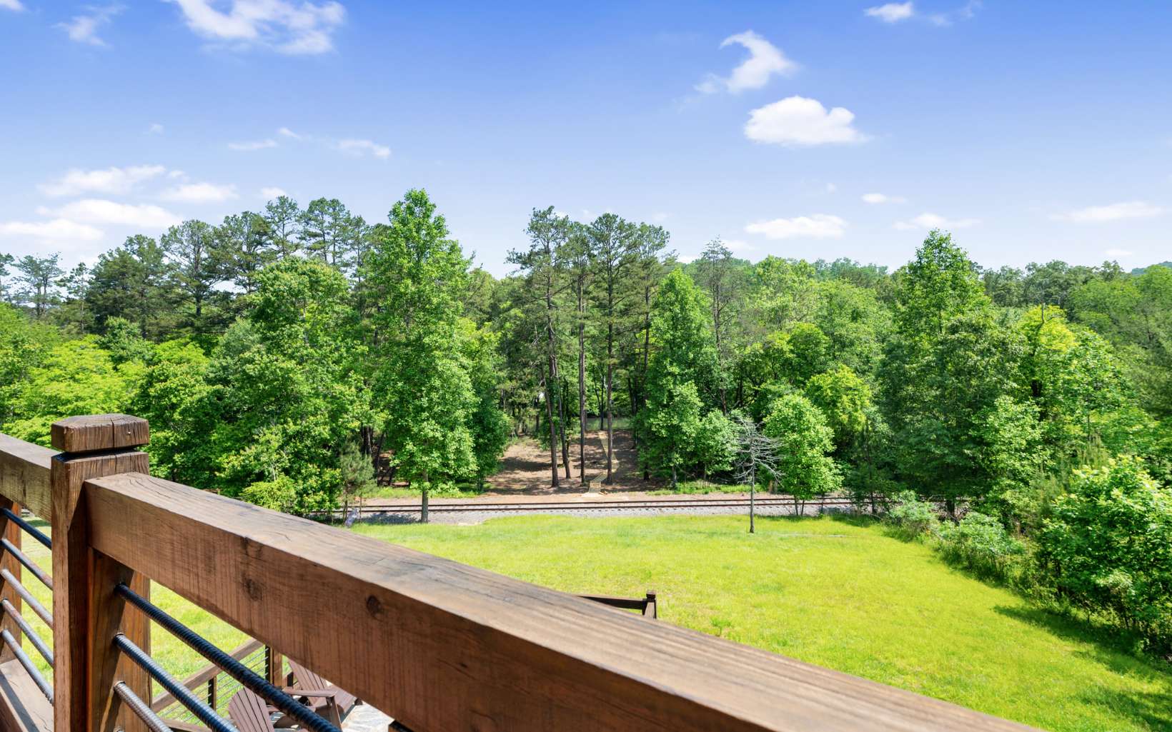 142 Cascade Trail Blue Ridge, GA 30513 - Photo 15 of 74 a view of a swimming pool with an outdoor space and seating area