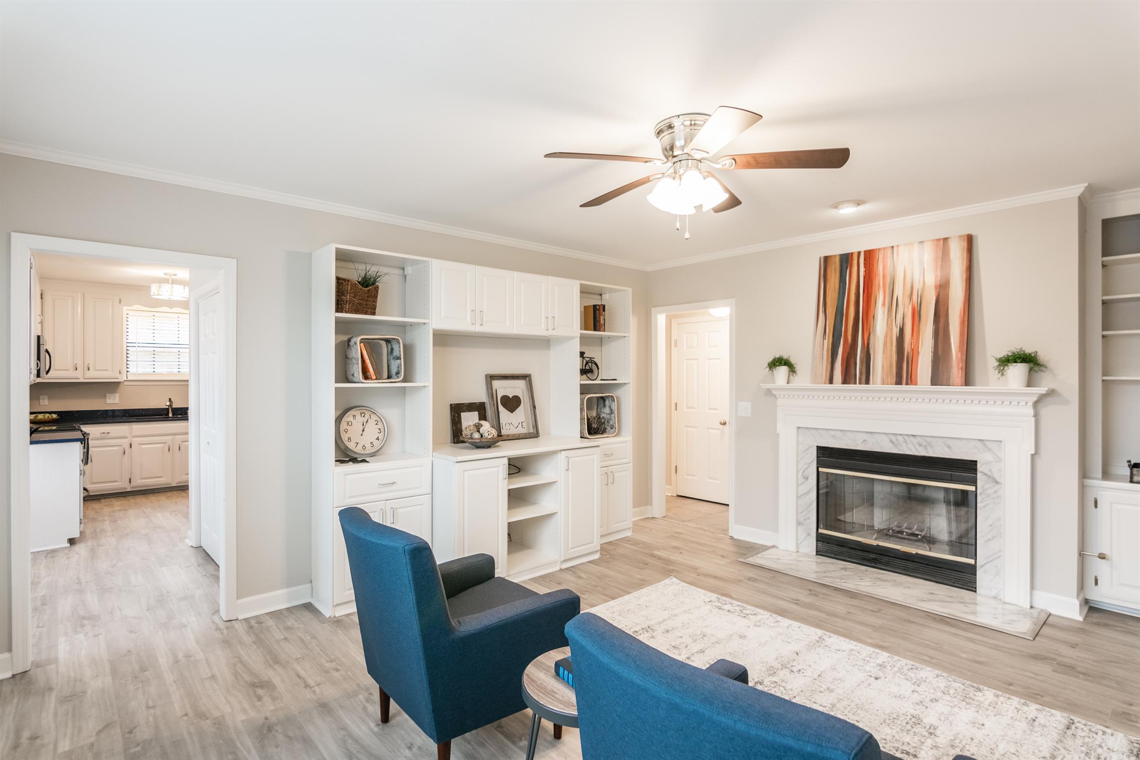 701 General George Patton Road Nashville, TN 37221 - Photo 15 of 27 a living room with furniture and a fireplace