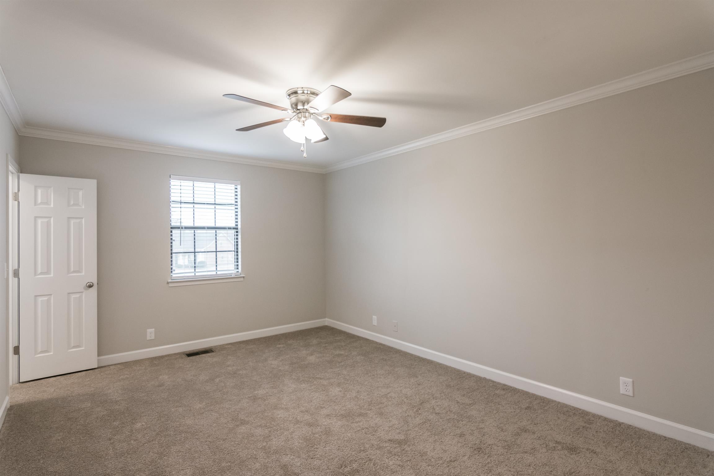 701 General George Patton Road Nashville, TN 37221 - Photo 19 of 27 an empty room with windows and fan