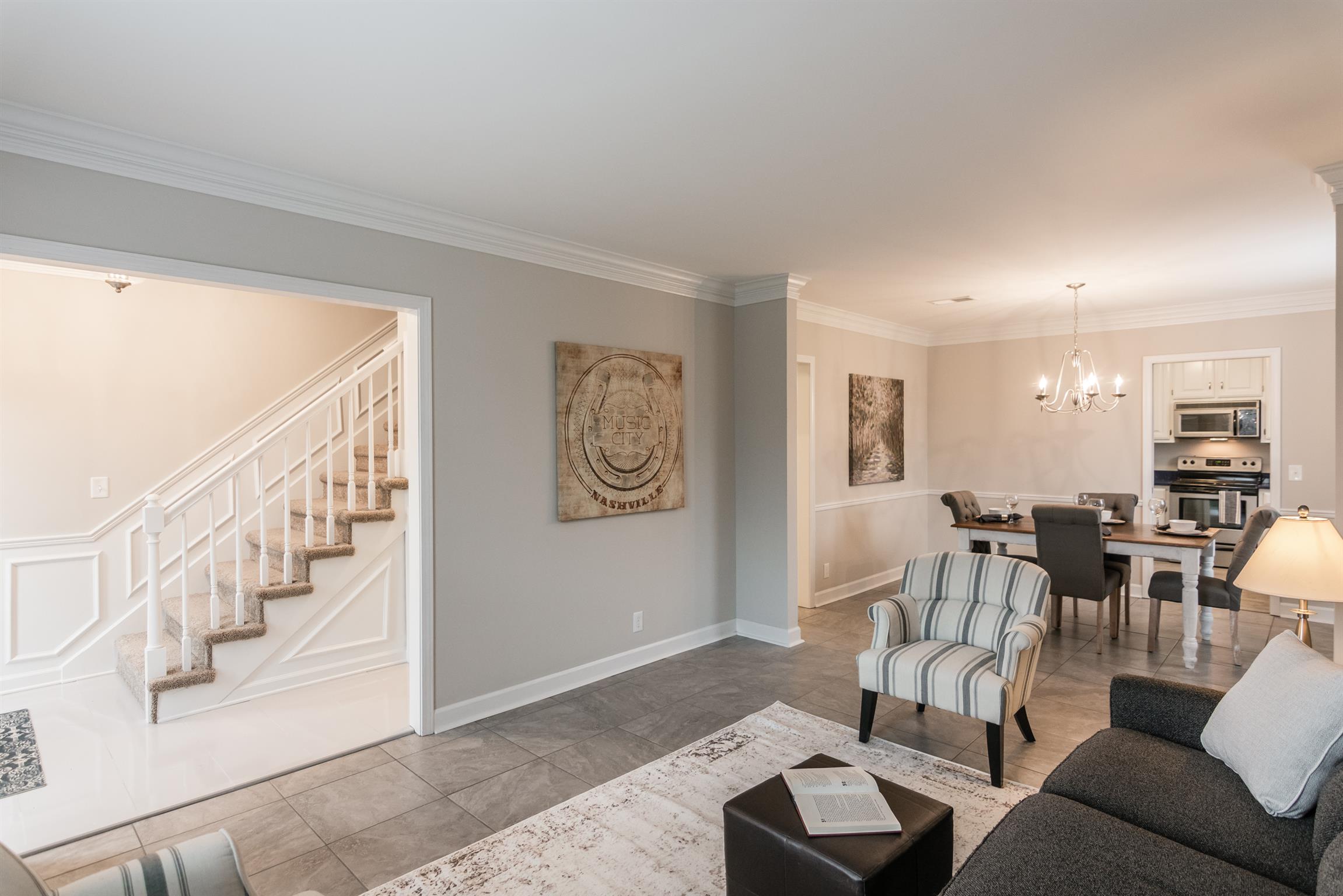 701 General George Patton Road Nashville, TN 37221 - Photo 5 of 27 a living room with furniture and wooden floor