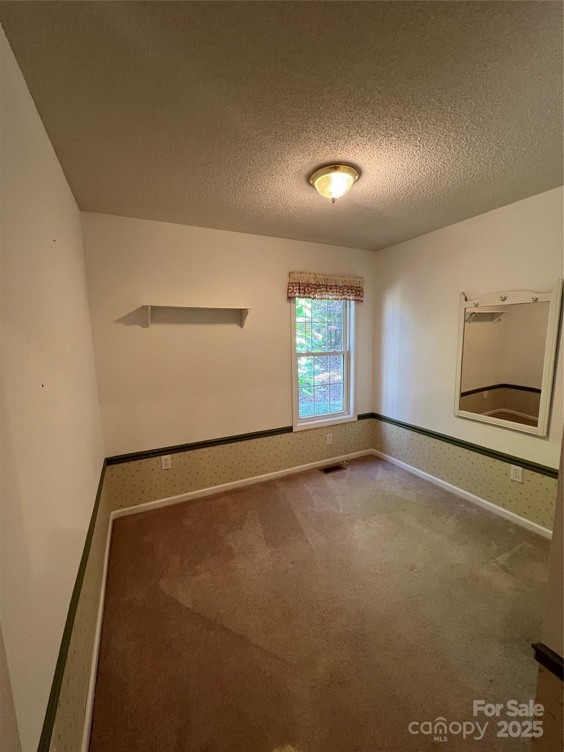 25397 Stony Mountain Road Albemarle, NC 28001 - Photo 27 of 32 a view of an empty room with a window