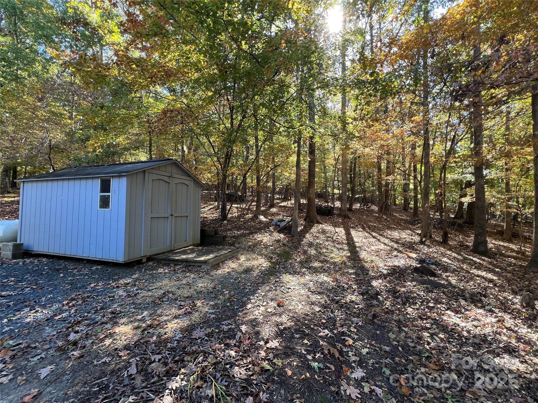 25397 Stony Mountain Road Albemarle, NC 28001 - Photo 31 of 32 a view of backyard with green space