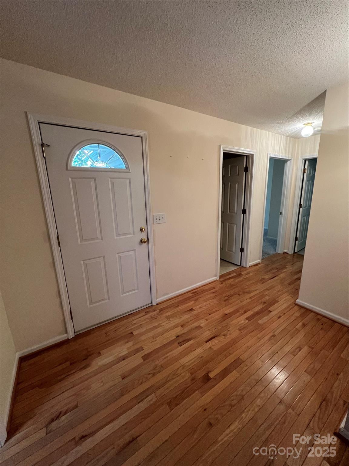 25397 Stony Mountain Road Albemarle, NC 28001 - Photo 6 of 32 a view of empty room with wooden floor