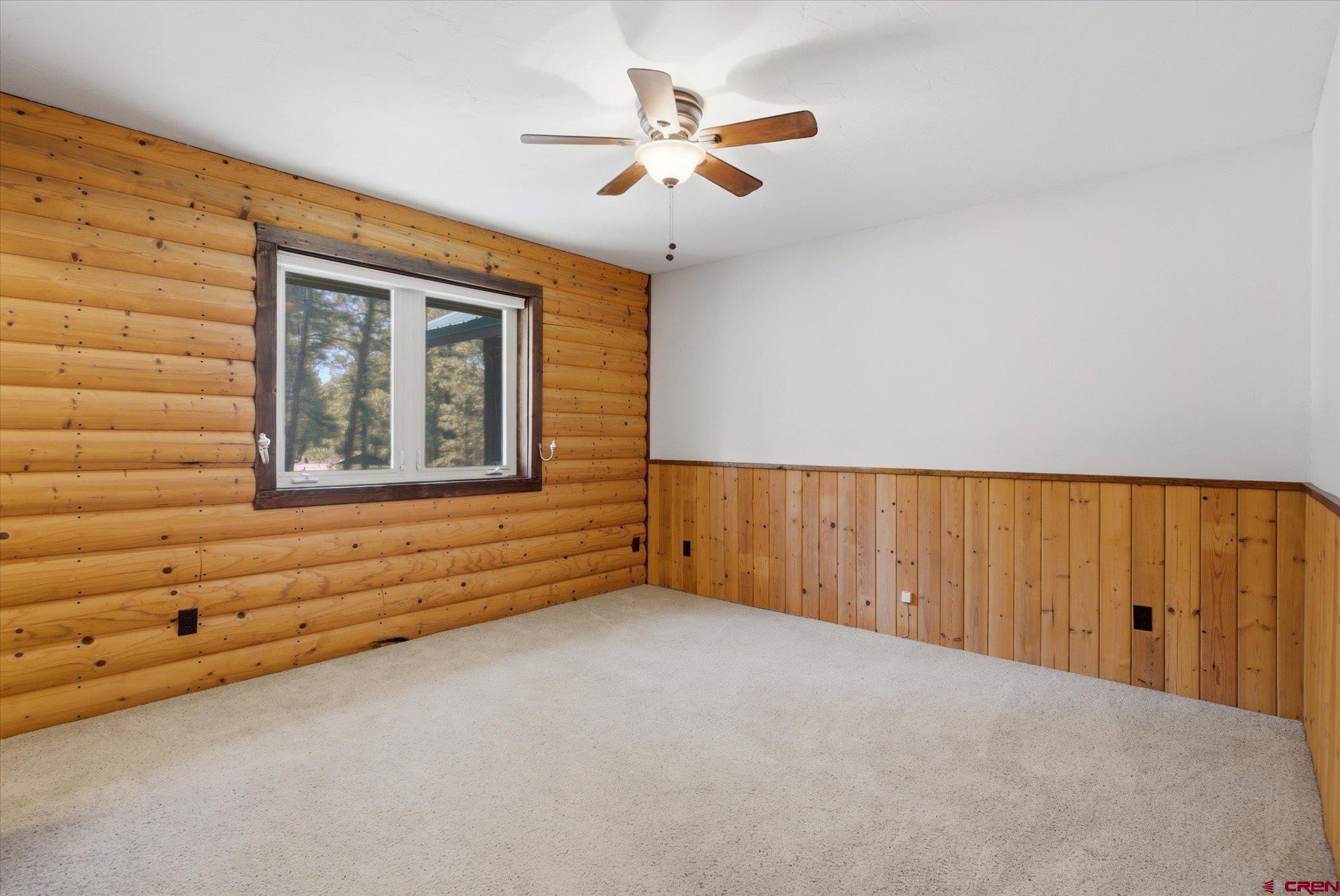 30 Stage Coach Road Bayfield, CO 81122 - Photo 15 of 43 en empty room with windows