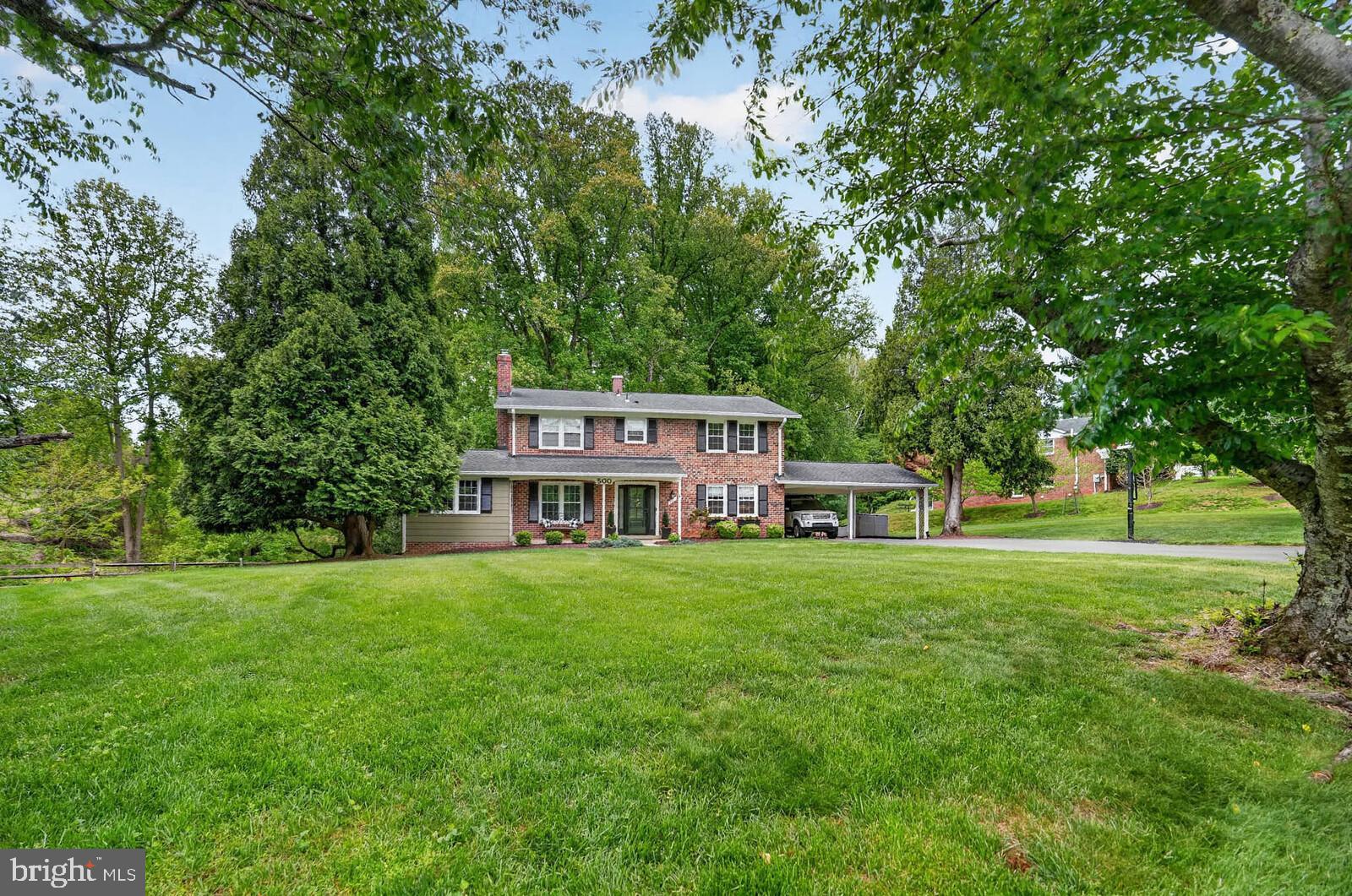 500 Finsbury Road Silver Spring, MD 20904 - Photo 39 of 54 a house view with a sitting space and garden