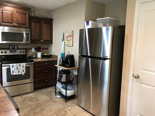1406 Ovoca Road Tullahoma, TN 37388 - Photo 12 of 25 Stainless LG Smart Inverter fridge stays.