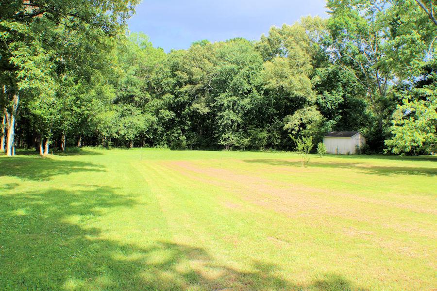 1406 Ovoca Road Tullahoma, TN 37388 - Photo 21 of 25 Deep back yard has plenty of room for garden, playground equipment or playing "fetch" with doggie.
