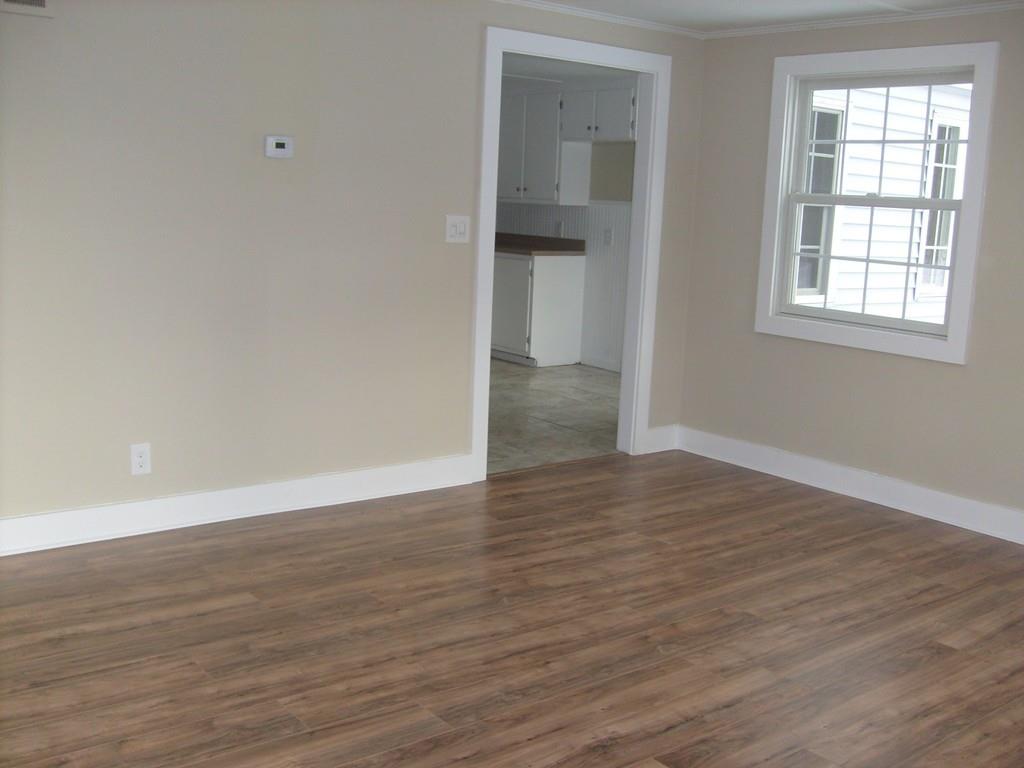 49 Birch Meadow Road Merrimac, MA 01860 - Photo 11 of 27 a view of wooden floor and windows in a room