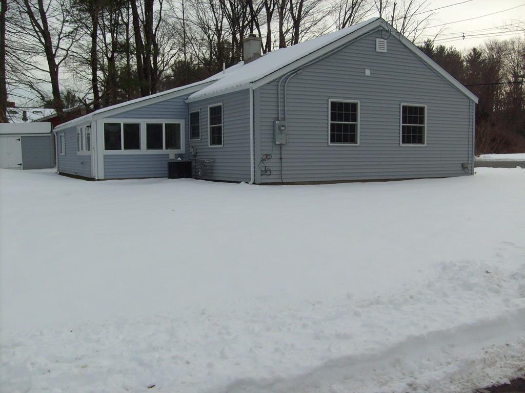 49 Birch Meadow Road Merrimac, MA 01860 - Photo 2 of 27 a house with trees in the background