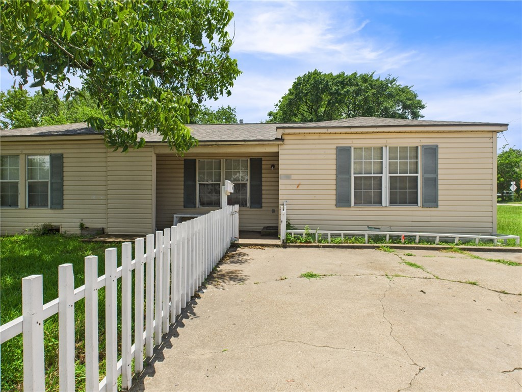 2702 Cavitt Avenue Bryan, TX 77801 - Photo 3 of 21 View of front of property featuring roof with shingles