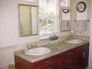 1590 Old Adobe Road Petaluma, CA 94954 - Photo 8 of 9 a bathroom with a granite countertop sink and a mirror