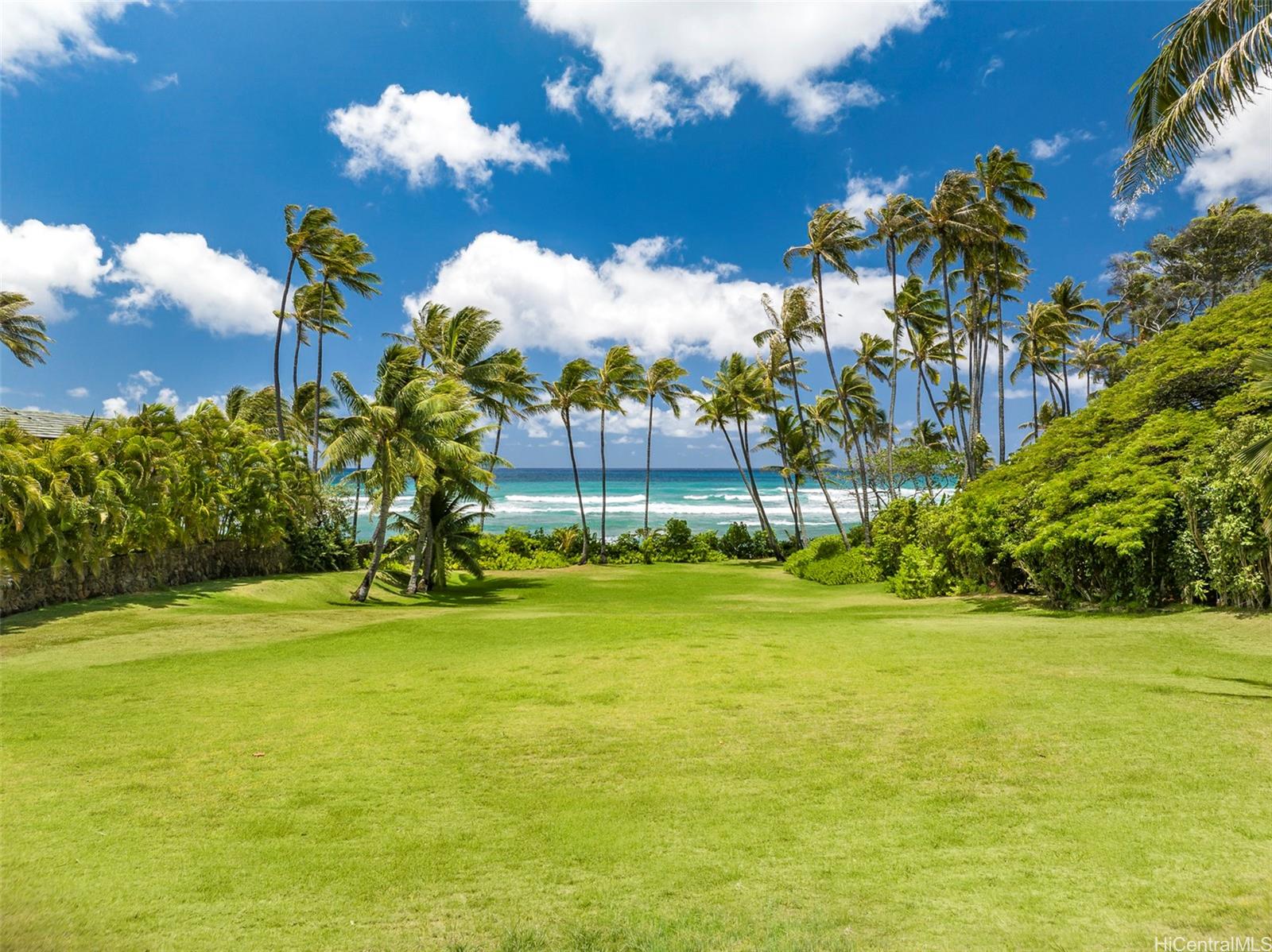 3707 Diamond Head Road Honolulu, HI 96816 - Photo 1 of 1 a view of a swimming pool with an outdoor space and seating area