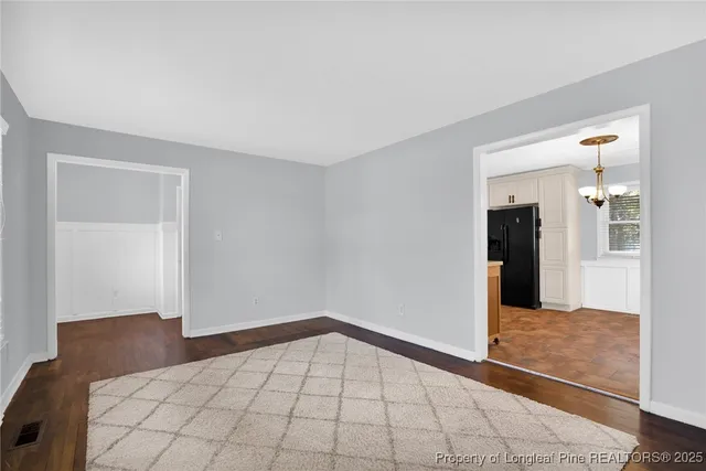 a view of an empty room and window