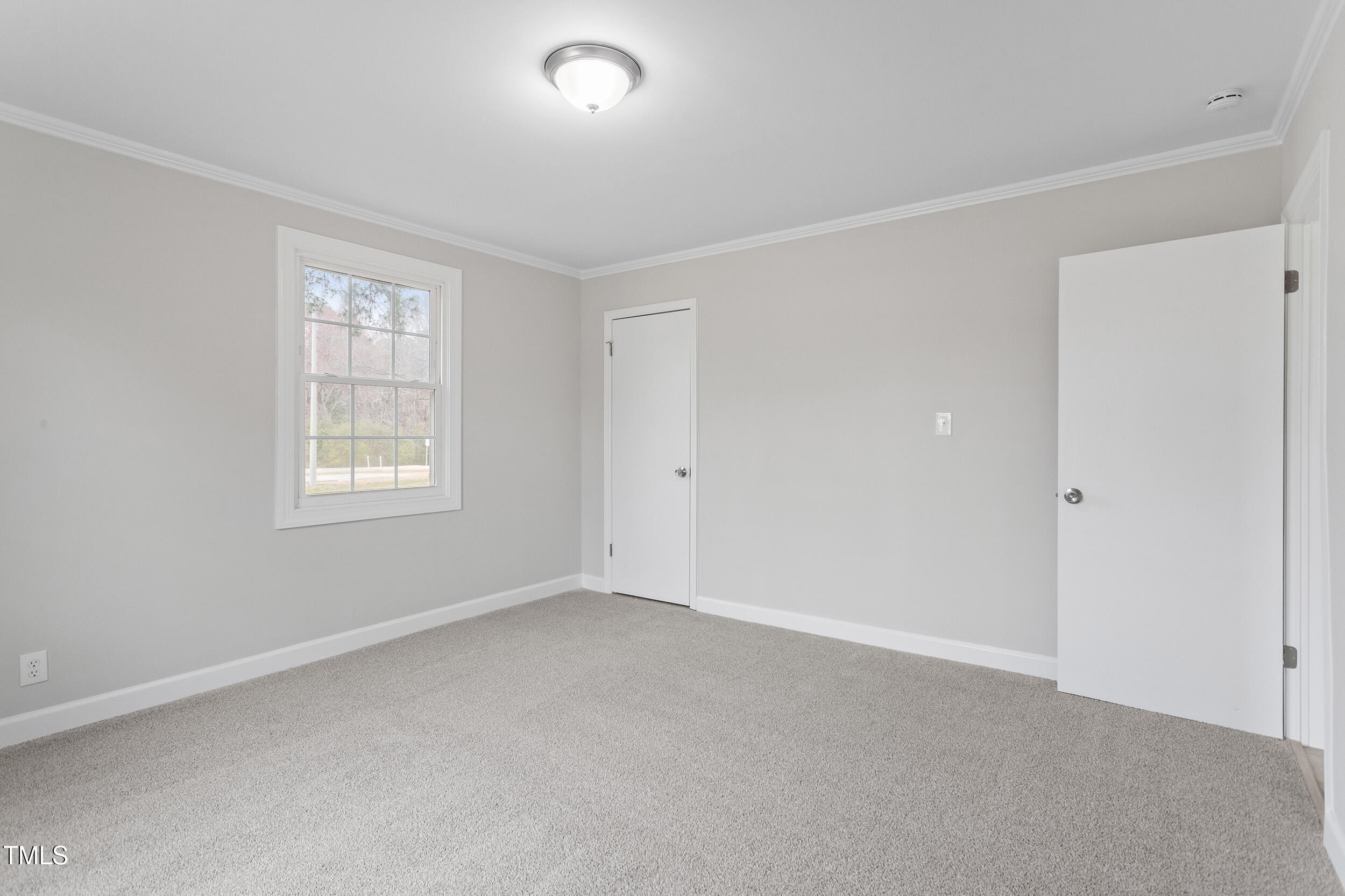 6215 Pine Street Bailey, NC 27807 - Photo 12 of 24 an empty room with windows