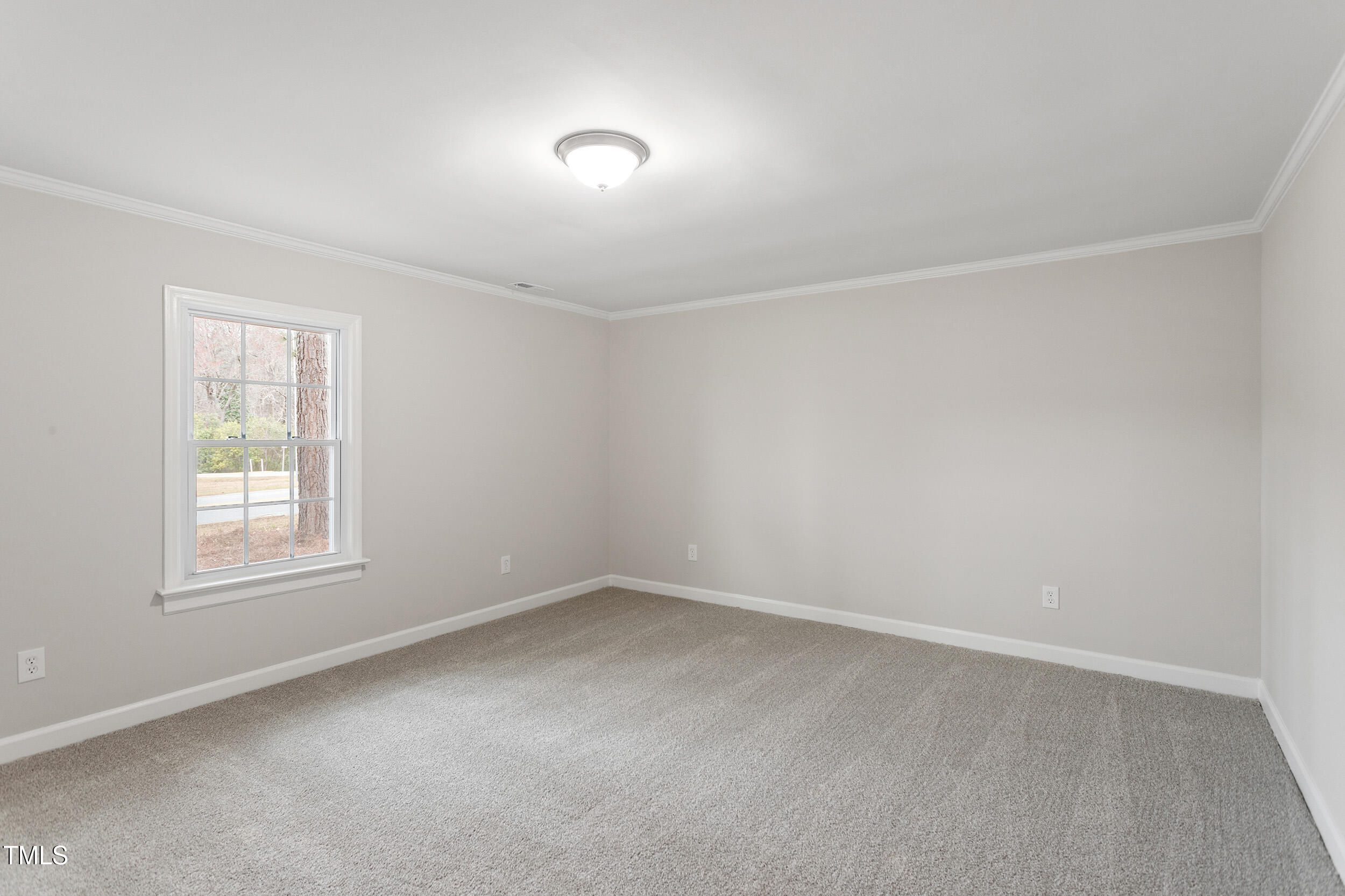 6215 Pine Street Bailey, NC 27807 - Photo 17 of 24 an empty room with a window