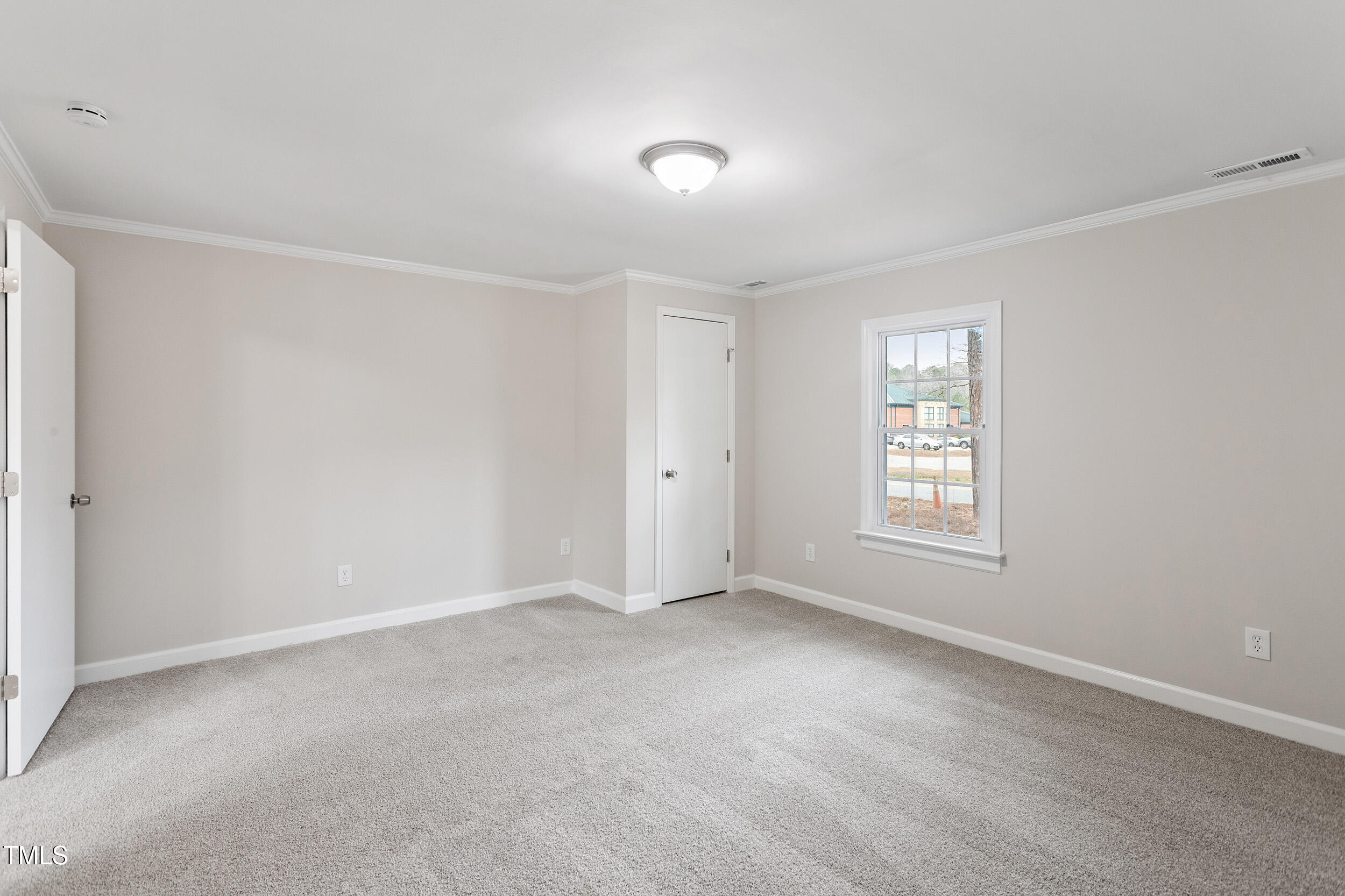 6215 Pine Street Bailey, NC 27807 - Photo 18 of 24 a view of an empty room with a window
