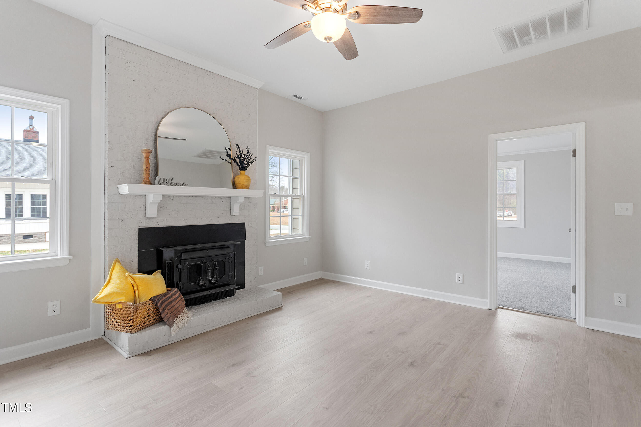 6215 Pine Street Bailey, NC 27807 - Photo 3 of 24 a living room with furniture and a fireplace