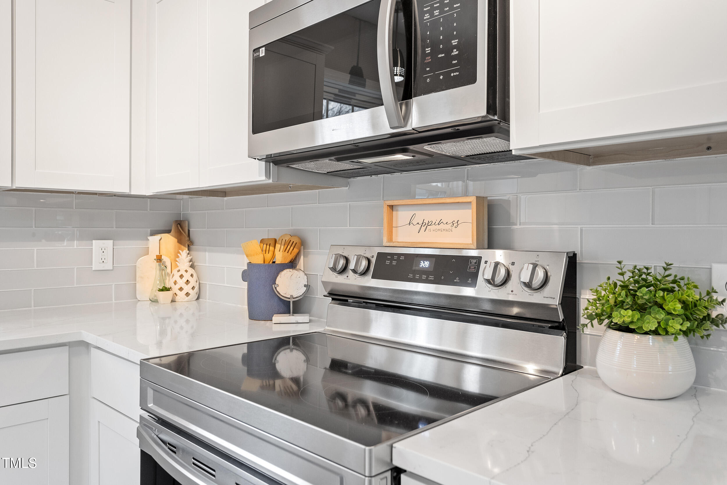 6215 Pine Street Bailey, NC 27807 - Photo 10 of 24 a kitchen with a sink and a stove top oven