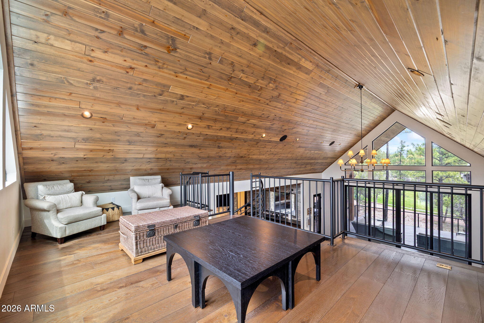 2441 South Monkshood Road Show Low, AZ 85901 - Photo 17 of 90 a livingroom with furniture window and wooden floor