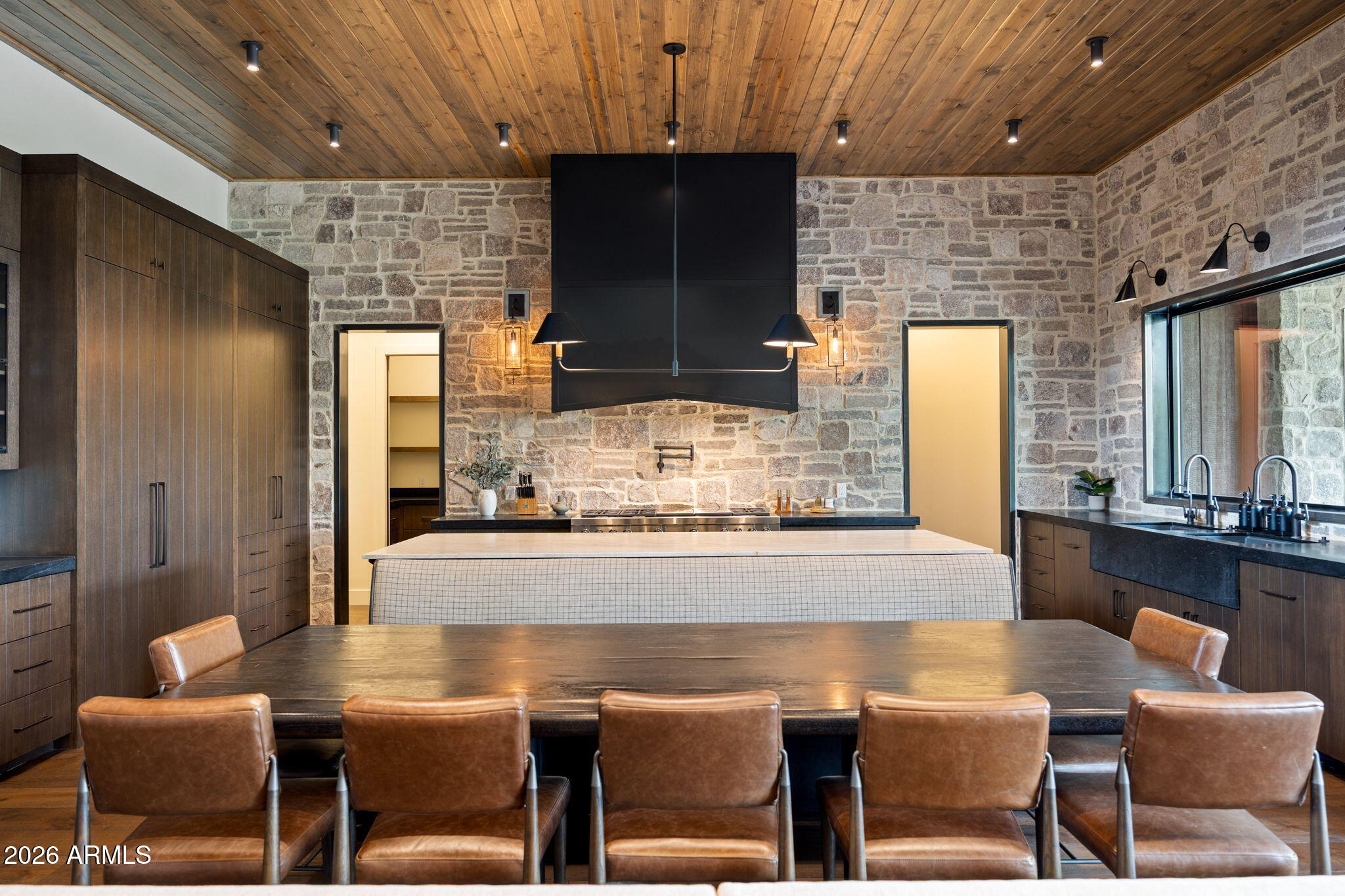 2441 South Monkshood Road Show Low, AZ 85901 - Photo 19 of 90 a dining room with furniture and a fireplace