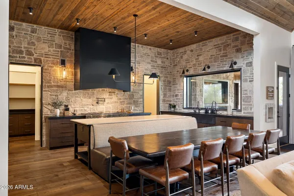 a view of a dining room with furniture window and outside view