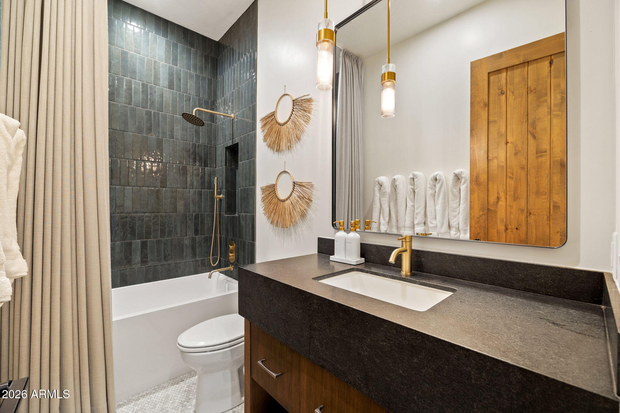 2441 South Monkshood Road Show Low, AZ 85901 - Photo 63 of 90 a bathroom with a double vanity sink toilet and shower