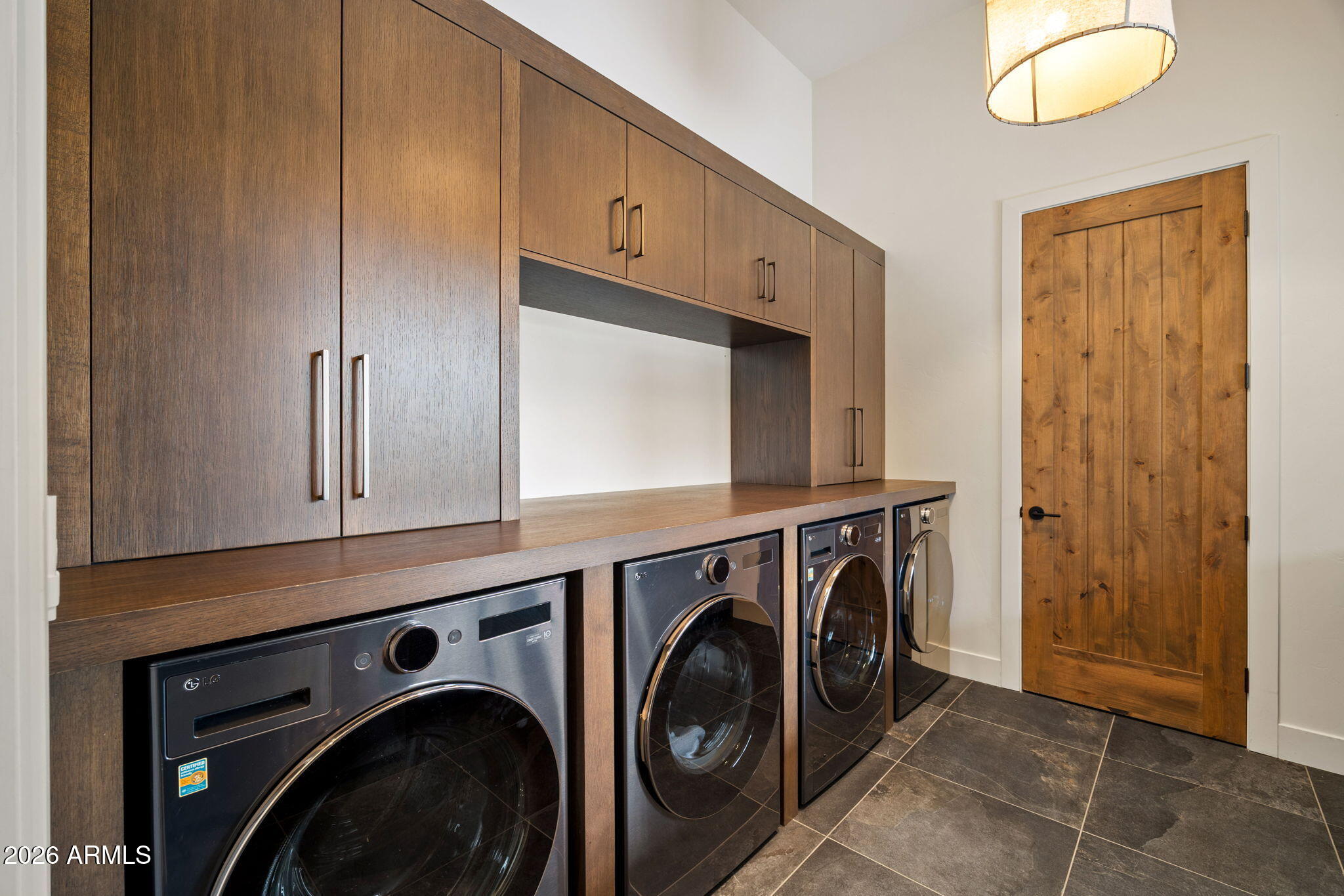 2441 South Monkshood Road Show Low, AZ 85901 - Photo 69 of 90 a utility room with mirror dryer and washer