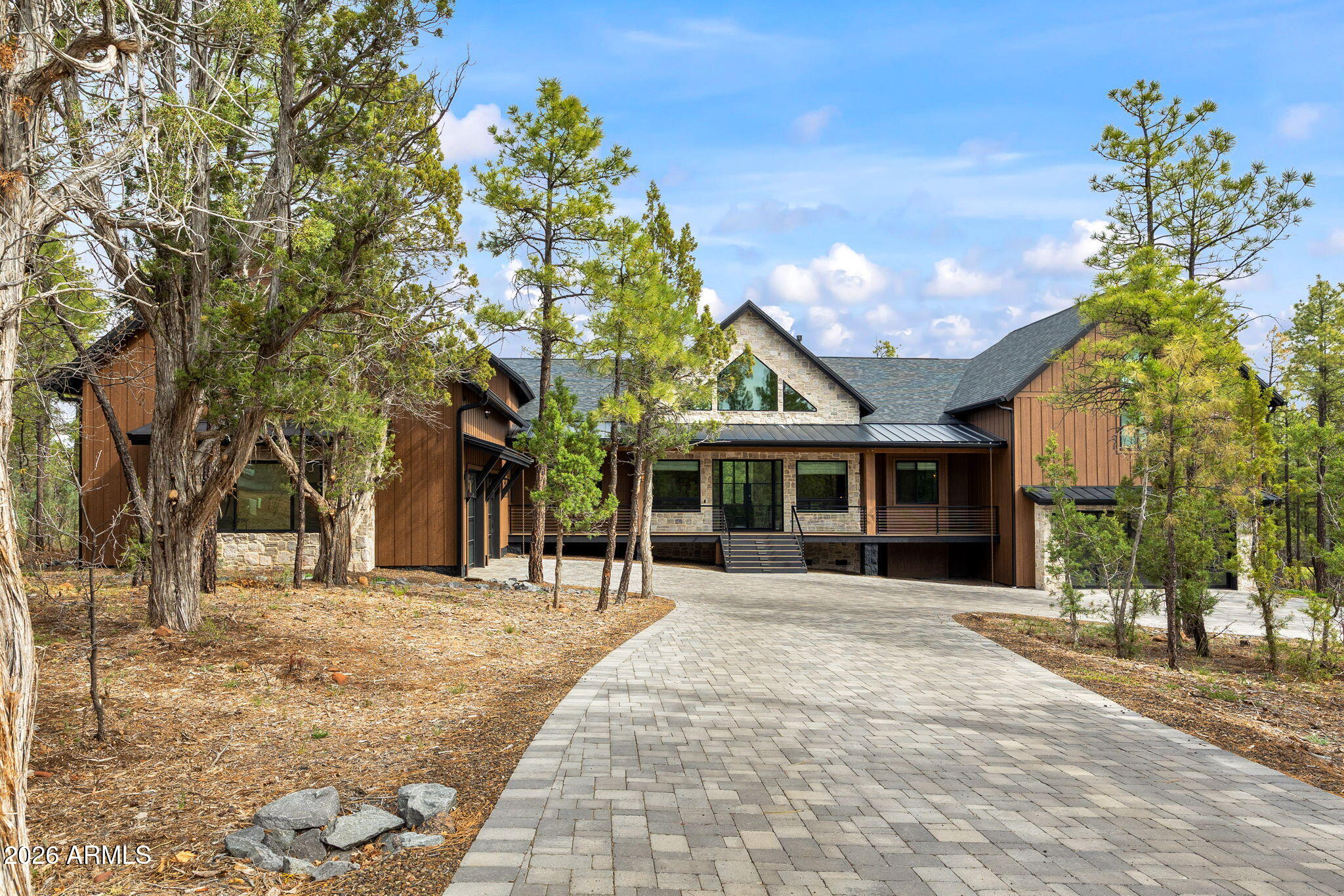2441 South Monkshood Road Show Low, AZ 85901 - Photo 77 of 90 a front view of a house with a yard