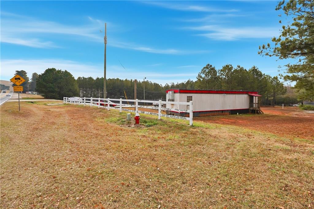 1052 Carl-Bethlehem Road Winder, GA 30680 - Photo 13 of 20 a view of a tennis court