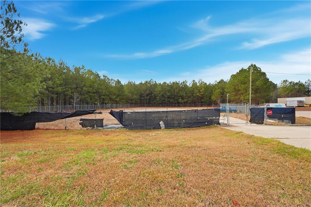 1052 Carl-Bethlehem Road Winder, GA 30680 - Photo 19 of 20 a view of swimming pool with a yard