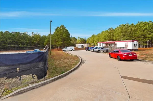 a view of a street with cars