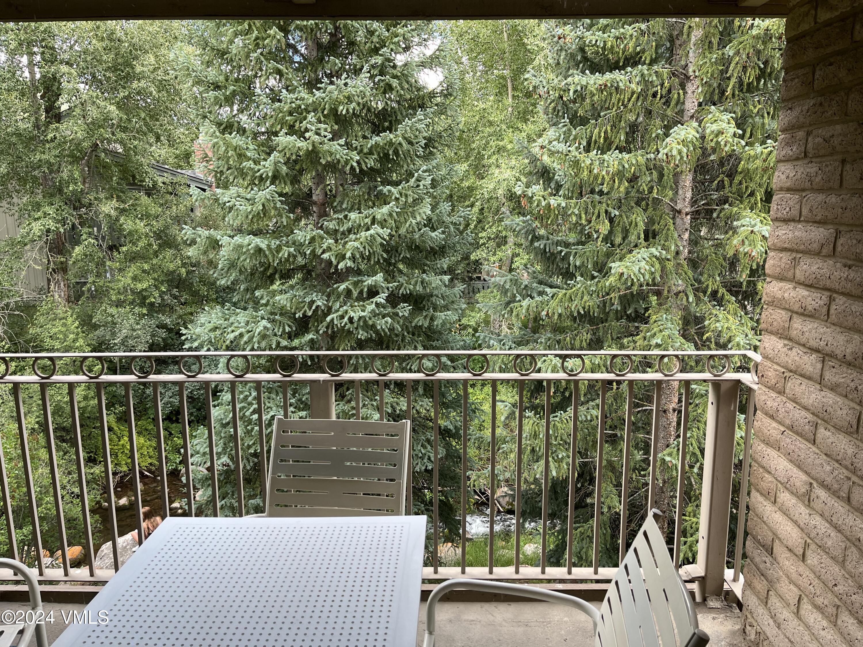 1020 Vail View Drive, Unit 331214&15 Vail, CO 81657 - Photo 3 of 19 a view of a balcony with yard