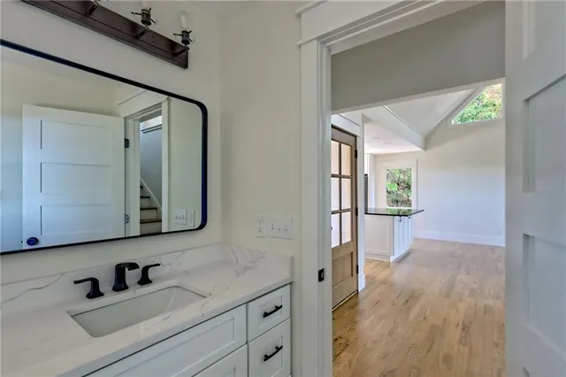 a view of a balcony with wooden floor