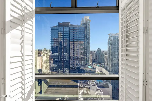 a view of a city with tall buildings