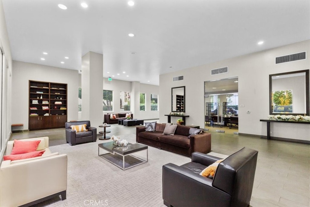 10501 Wilshire Boulevard, Unit 2212 Los Angeles, CA 90024 - Photo 23 of 25 a living room with furniture and wooden floor