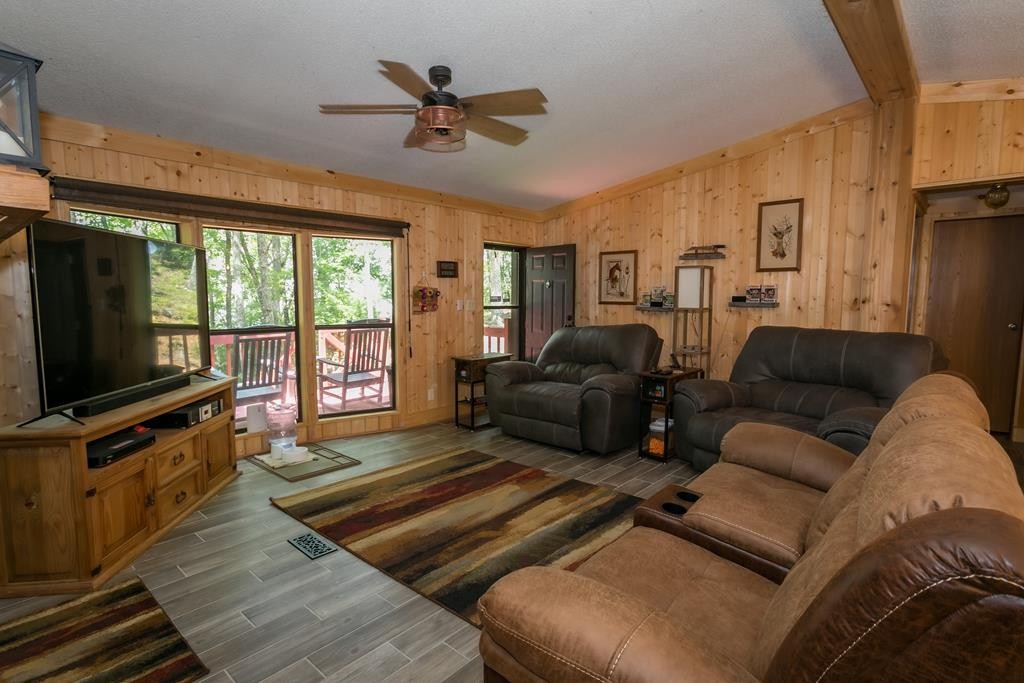 3260 Duncan Springs Road Seymour, TN 37865 - Photo 4 of 32 a living room with furniture and a flat screen tv