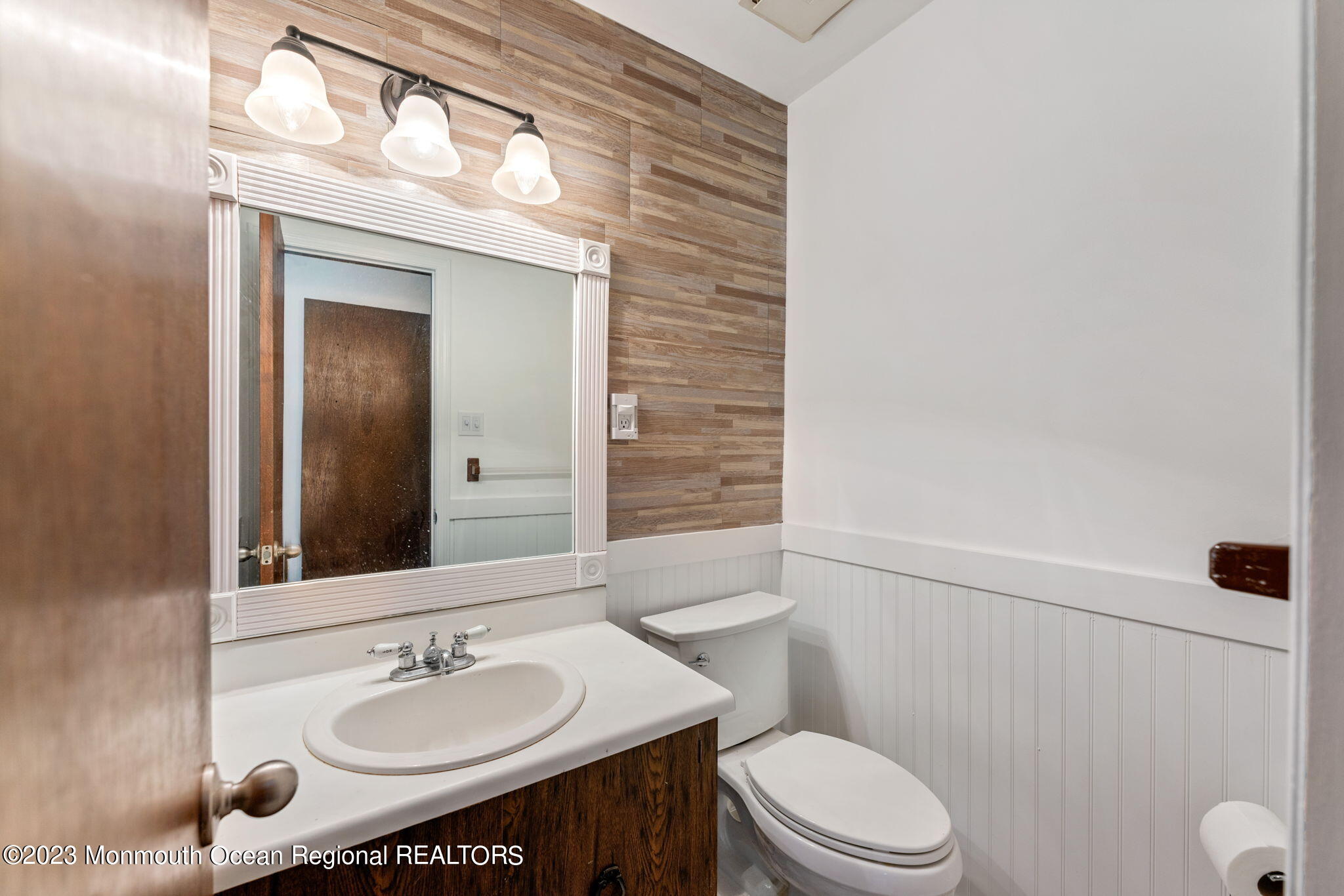 35 Lambert Johnson Drive Asbury Park, NJ 07712 - Photo 14 of 34 a bathroom with a sink a toilet and shower