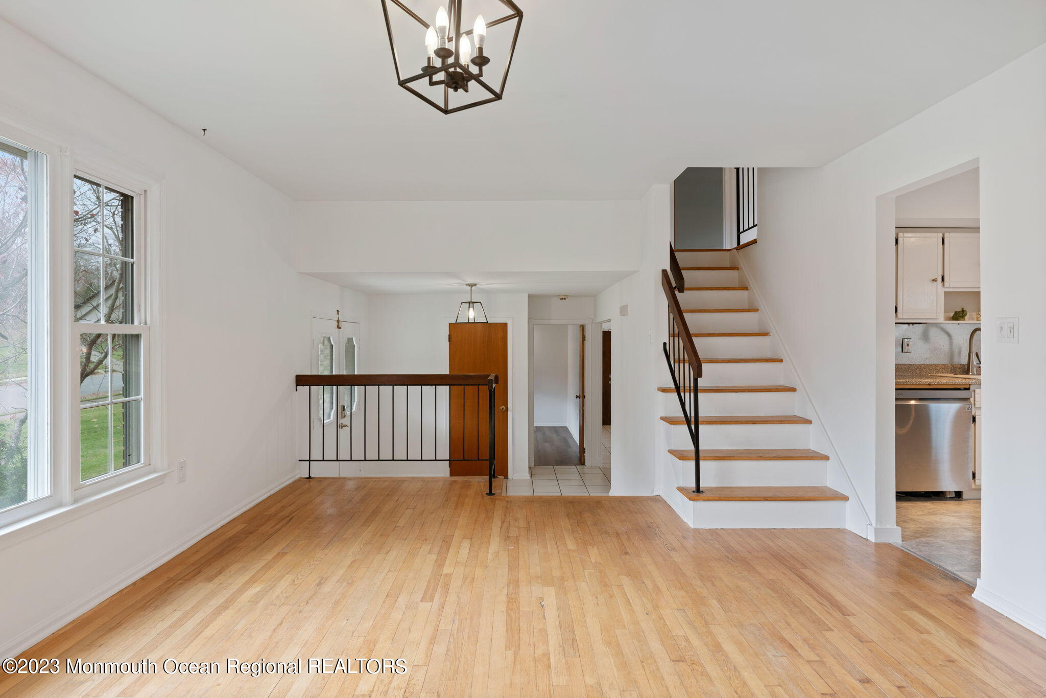 35 Lambert Johnson Drive Asbury Park, NJ 07712 - Photo 21 of 34 a view of empty room with wooden floor and windows