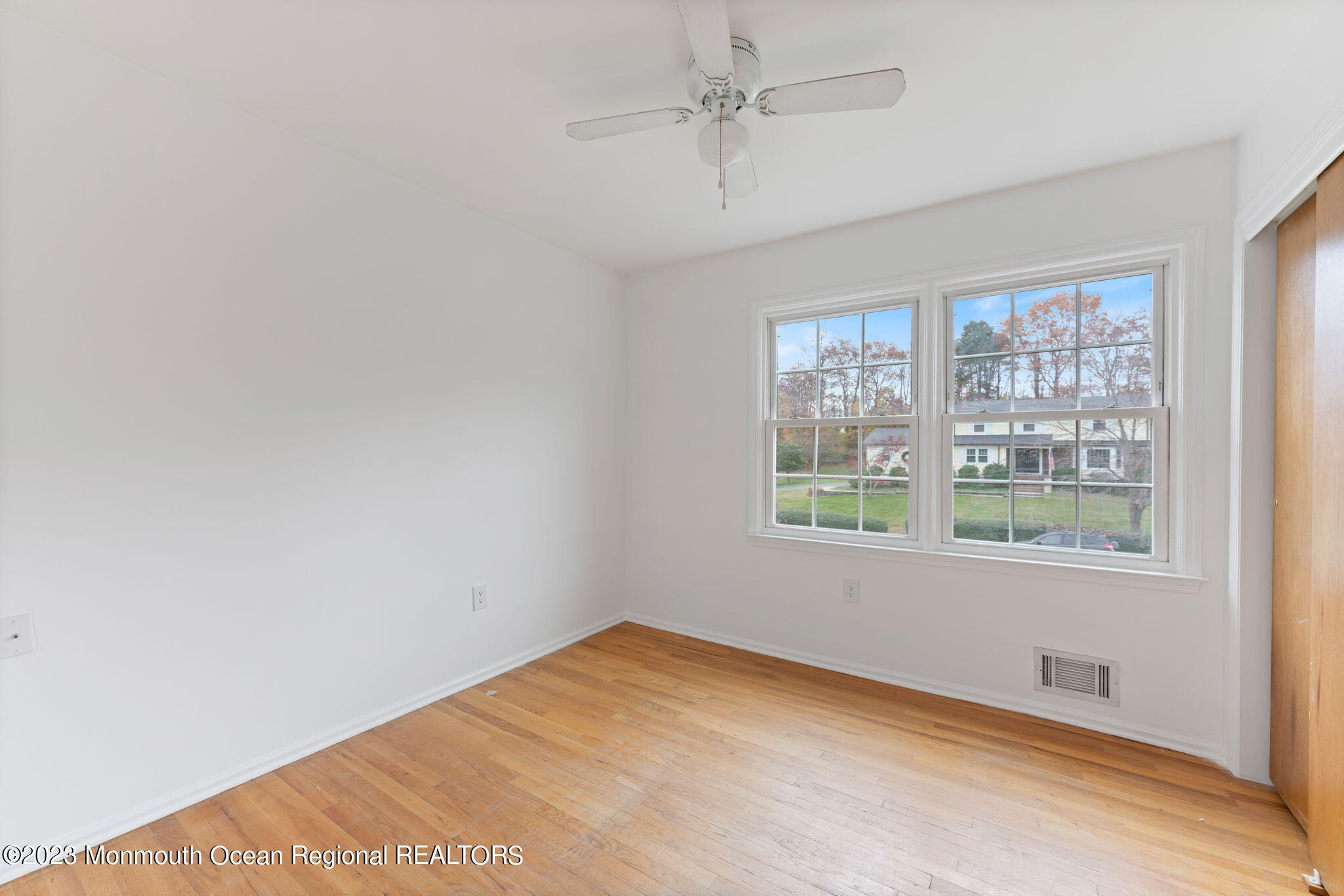 35 Lambert Johnson Drive Asbury Park, NJ 07712 - Photo 25 of 34 a view of an empty room with a window