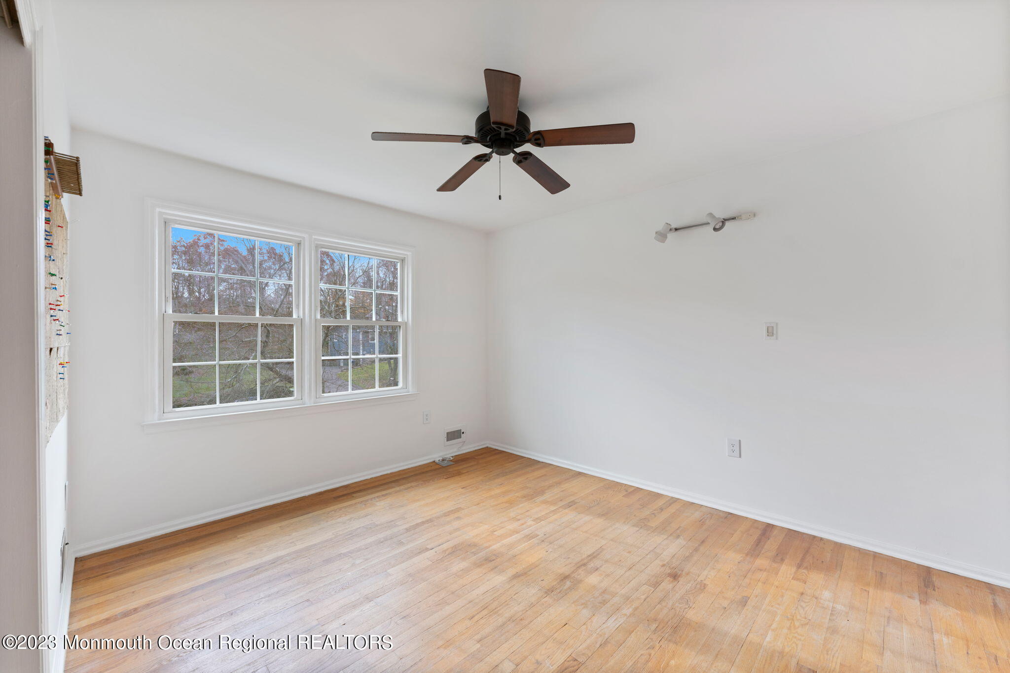 35 Lambert Johnson Drive Asbury Park, NJ 07712 - Photo 27 of 34 a view of empty room with windows