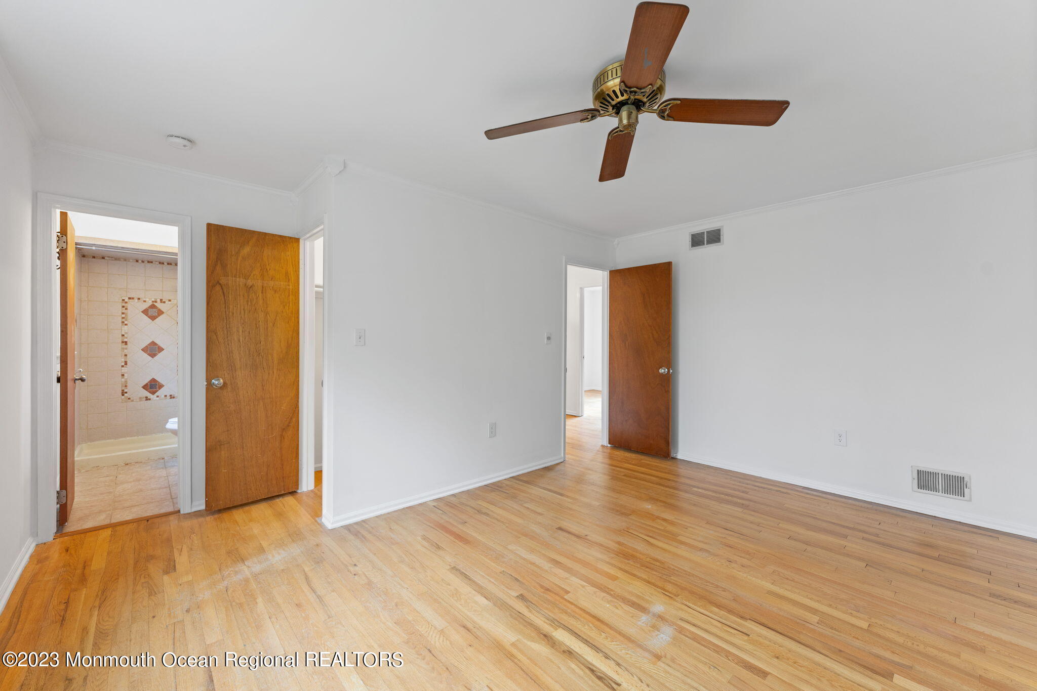 35 Lambert Johnson Drive Asbury Park, NJ 07712 - Photo 29 of 34 a view of empty room with wooden floor