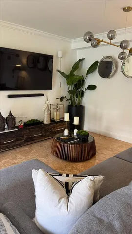 a bed sitting on top of a wooden floor