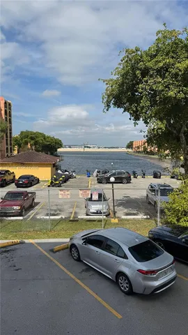 a kitchen with counter top space a sink and appliances