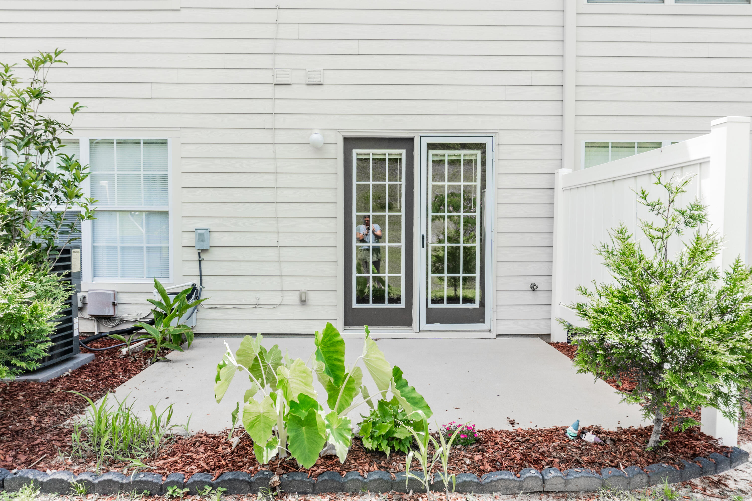 560 Wingspan Way Crestview, FL 32536 - Photo 2 of 18 a front view of a house with a garden