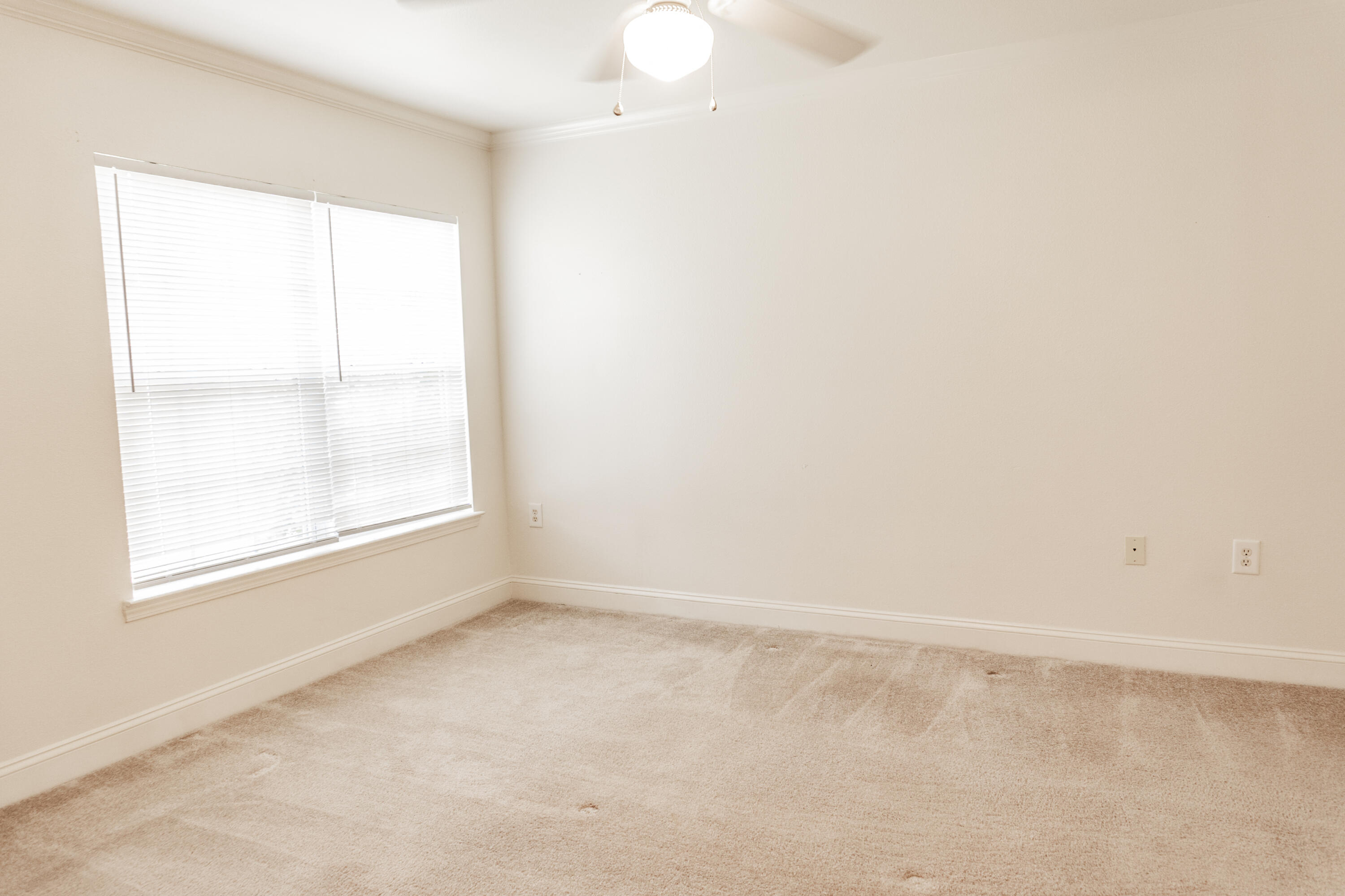 560 Wingspan Way Crestview, FL 32536 - Photo 8 of 18 an empty room with a window