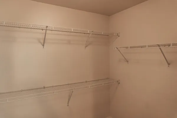 a view of a room with racks on the wall