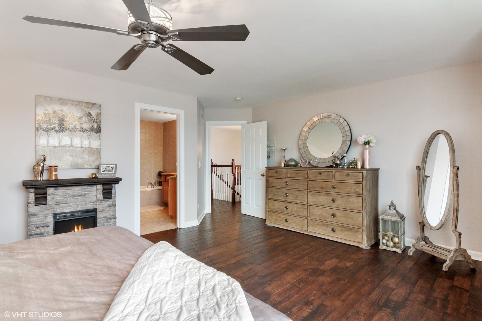 972 West Irving Park Road, Unit 3 Bensenville, IL 60106 - Photo 11 of 19 a bedroom with a bed and wooden floor